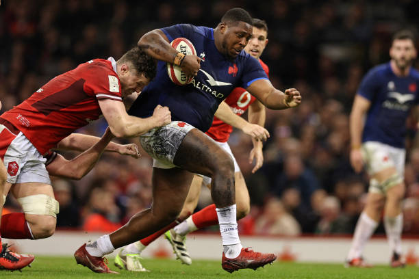 Wales' lock Will Rowlands tries to stop France's George-Henri Colombe during the Six Nations international rugby union match between Wales and France...