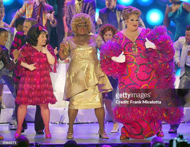 Actors Marissa Jaret Winokur , Mary Bond Davis , Harvey Fierstein and the cast of "Hairspray" perform on stage during the "57th Annual Tony Awards"...