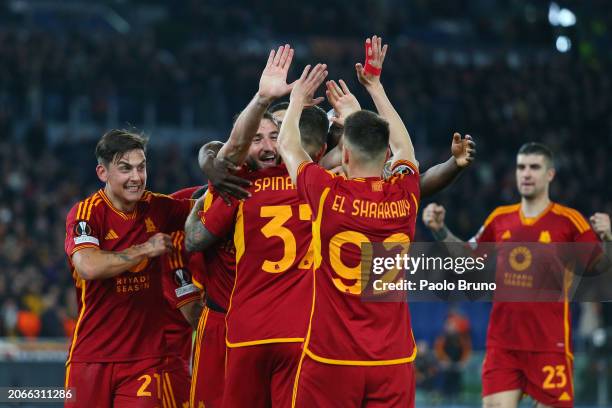 Bryan Cristante of AS Roma celebrates with teammates after scoring his team's fourth goal during the UEFA Europa League 2023/24 round of 16 first leg...