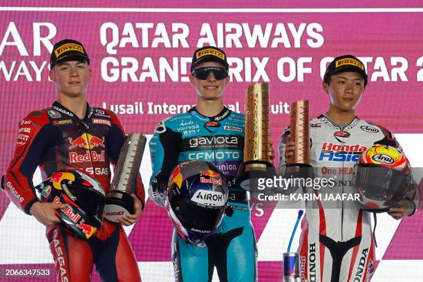 First placed CFMoto Aspar Team's Colombian rider David Alonso , second placed Red Bull GasGas Tech3's Spanish rider Daniel Holgado and third placed...