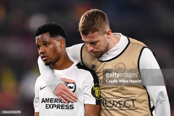 Ansu Fati of Brighton & Hove Albion is consoled by Adam Webster of Brighton & Hove Albion at full-time following the team's defeat in the UEFA Europa...