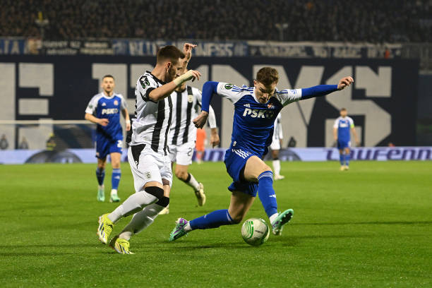 zagreb-croatia-andrija-zivkovic-of-paok-fc-and-mauro-perkovic-of-gnk-dinamo-zagreb-battle-for.jpg?s=612x612&w=0&k=20&c=yvKKNpOGRNCQI0DN2NcT07WUOTRPuGqeHyTdYybTBUw=