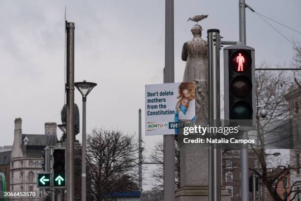 Yes campaign poster by political party Fianna Fáil can be seen in O'Connell Street, and the Spire, the GPO, and the Irish flag can be seen in the...