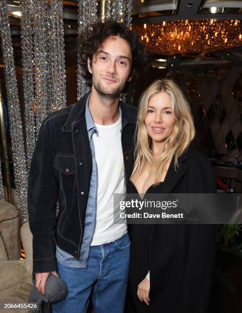 Oli Green and Sienna Miller attend the launch of the Pamela Anne Furze Foundation , supporting clinical research into hormonal cancers, at the...