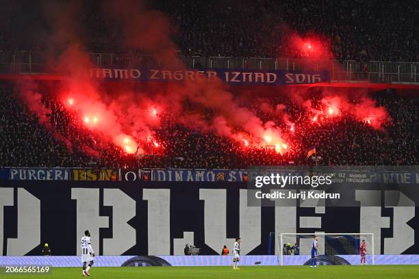 General view inside the stadium as fans of GNK Dinamo Zagreb set off flares during the UEFA Europa Conference League 2023/24 round of 16 first leg...