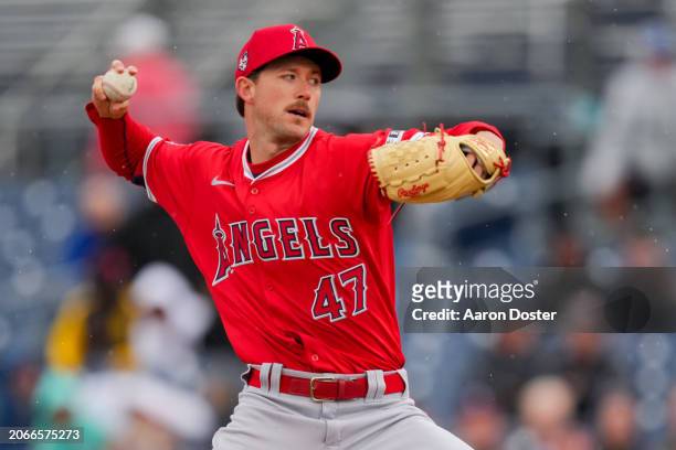 Griffin Canning of the Los Angeles Angels throws in the first inning during a spring training game against the Seattle Mariners at Peoria Sports...