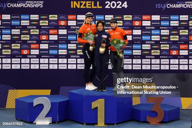 Jutta Leerdam of Netherlands poses with the silver, Miho Takagi of Japan with the gold and Femke Kok of Netherlands with the bronze after the victory...