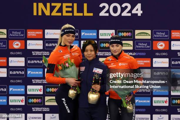 Jutta Leerdam of Netherlands poses with the silver, Miho Takagi of Japan with the gold and Femke Kok of Netherlands with the bronze after the victory...
