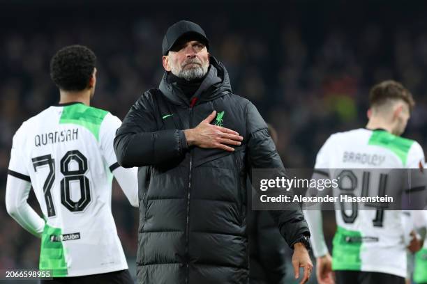 Jurgen Klopp, Manager of Liverpool, acknowledges the fans after the team's victory in the UEFA Europa League 2023/24 round of 16 first leg match...