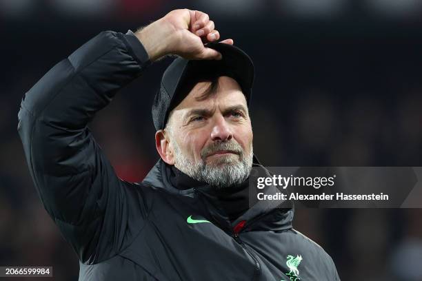 Juergen Klopp, Manager of Liverpool, acknowledges the fans after the team's victory in the UEFA Europa League 2023/24 round of 16 first leg match...