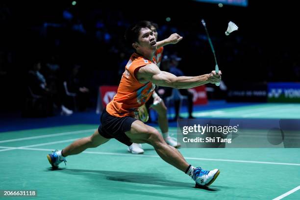 Supak Jomkoh and Kittinupong Kedren of Thailand compete in the Men's Doubles Second Round match against Liu Yuchen and Ou Xuanyi of China during day...