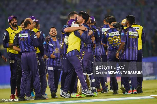 Quetta Gladiators' players celebrates during the Pakistan Super League Twenty20 cricket match between Quetta Gladiators and Lahore Qalandars at the...