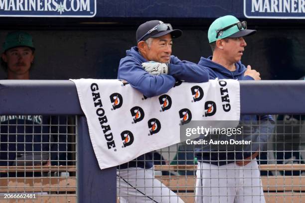 Ichiro Suzuki of the Seattle Mariners watches from the dugout in the second inning during a spring training game against the Los Angeles Angels at...