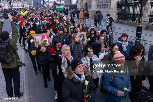 Women, children and allies take part in an International Women's Day action organised by groups including Parents for Palestine, Parents for Future...