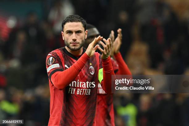 Davide Calabria of AC Milan celebrates the win at the end of the UEFA Europa League 2023/24 round of 16 first leg match between AC Milan and Slavia...