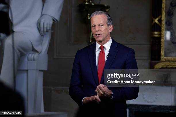 Sen. John Thune participates in a TV interview at the U.S. Capitol Building on March 07, 2024 in Washington, DC. U.S. President Joe Biden will make...