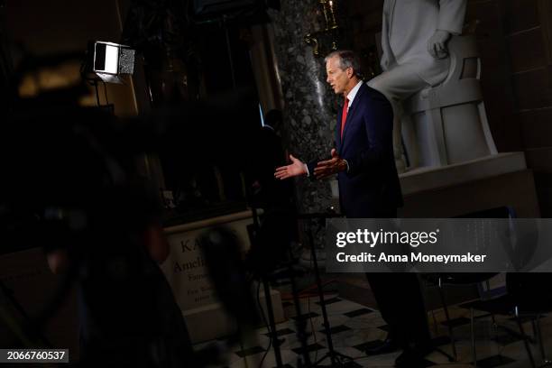 Sen. John Thune participates in a TV interview at the U.S. Capitol Building on March 07, 2024 in Washington, DC. U.S. President Joe Biden will make...