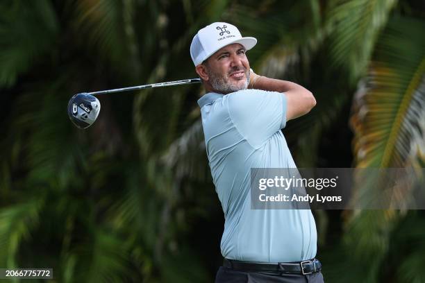 Scott Piercy of the United States plays his shot from the fourth tee during the first round of the Puerto Rico Open at Grand Reserve Golf Club on...