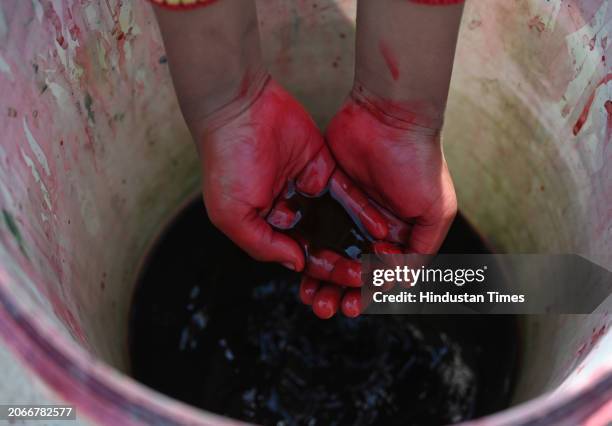 Making of gulal color and keeping them under sunlight is in process at sector-20 ahead of the Holi festival, on March 10, 2024 in Noida, India. Gulal...