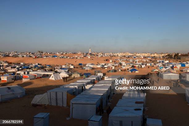 This picture shows a camp for displaced Palestinians in Rafah, in the southern Gaza Strip, on the eve of the Muslim holy fasting month of Ramadan on...