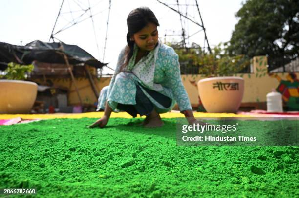 Making of gulal color and keeping them under sunlight is in process at sector-20 ahead of the Holi festival, on March 10, 2024 in Noida, India. Gulal...