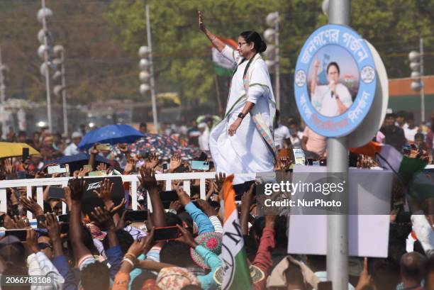 Chief Minister of West Bengal state and Trinamool Congress party leader Mamata Banerjee is gesturing as she arrives to address an election rally in...