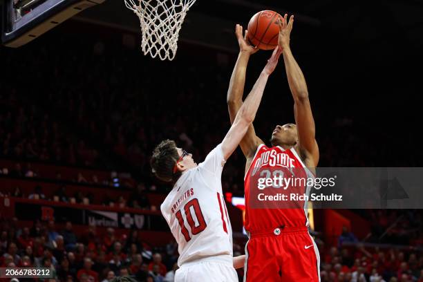 Zed Key of the Ohio State Buckeyes attempts a shot as Gavin Griffiths of the Rutgers Scarlet Knights defends during the first half of a game at...