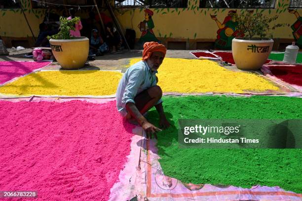 Making of gulal color and keeping them under sunlight is in process at sector-20 ahead of the Holi festival, on March 10, 2024 in Noida, India. Gulal...