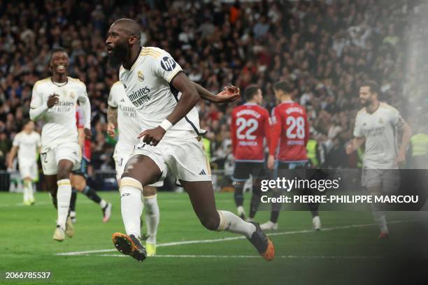 Real Madrid's German defender Antonio Rudiger celebrates Celta's owngoal during the Spanish league football match between Real Madrid CF and RC Celta...