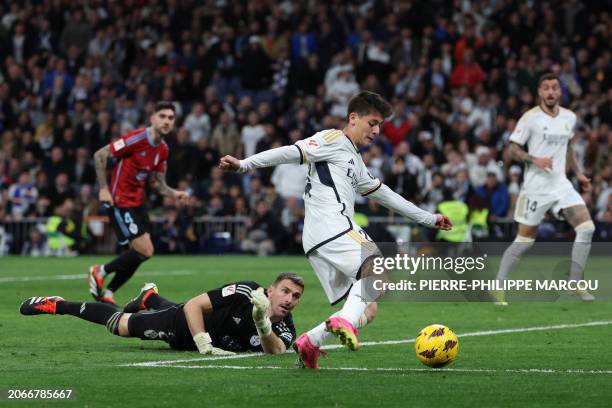 Real Madrid's Turkish midfielder Arda Guler scores his team's fourth goal during the Spanish league football match between Real Madrid CF and RC...