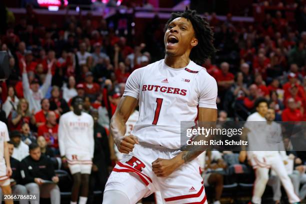 Jamichael Davis of the Rutgers Scarlet Knights reacts after making a dunk against the Ohio State Buckeyes during the second half of a game at Jersey...