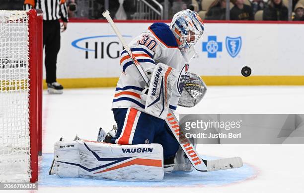 Calvin Pickard of the Edmonton Oilers tracks a shot in the third period during the game against the Pittsburgh Penguins at PPG PAINTS Arena on March...