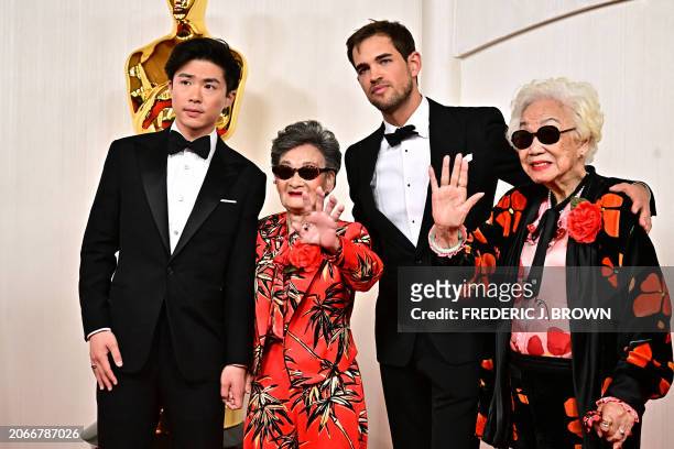 Director Sean Wang, Zhang Li Hua, Sam Davis and Yi Yan Fuei attend the 96th Annual Academy Awards at the Dolby Theatre in Hollywood, California on...