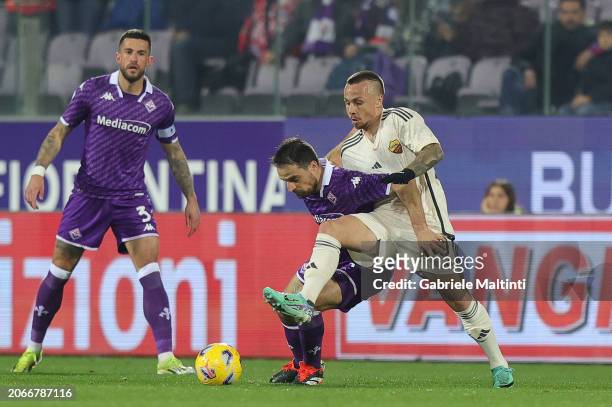 Giacomo Bonaventura of ACF Fiorentina battles for the ball with Angelino of AS Roma during the Serie A TIM match between ACF Fiorentina and AS Roma -...