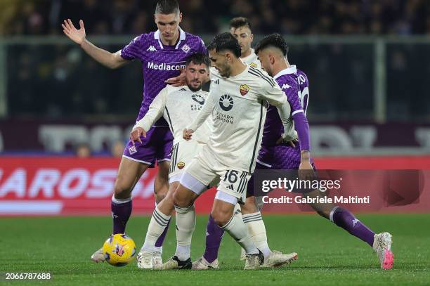 Leandro PAredes and Hoiussem Aouar in action against Nikola Milenkovic and Nicolás Iván González of ACF Fiorentina during the Serie A TIM match...