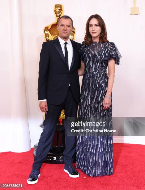 Hollywood, CA John Battsek and Sarah Thomson arriving on the red carpet at the 96th Annual Academy Awards in Dolby Theatre at Hollywood & Highland...