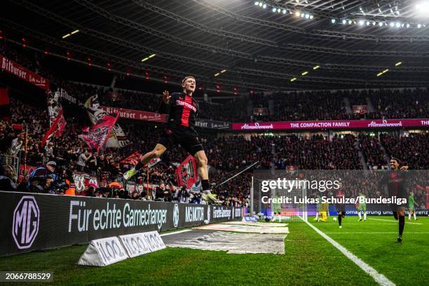 Florian Wirtz of Leverkusen celebrates after scoring his team's second goal during the Bundesliga match between Bayer 04 Leverkusen and VfL Wolfsburg...