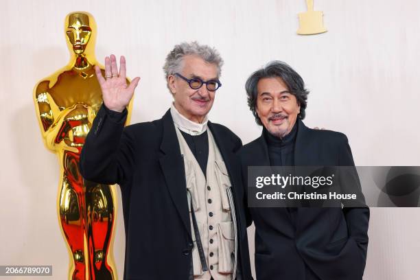 Hollywood, CA Wim Wenders and Kôji Yakusho arriving on the red carpet at the 96th Annual Academy Awards in Dolby Theatre at Hollywood & Highland...