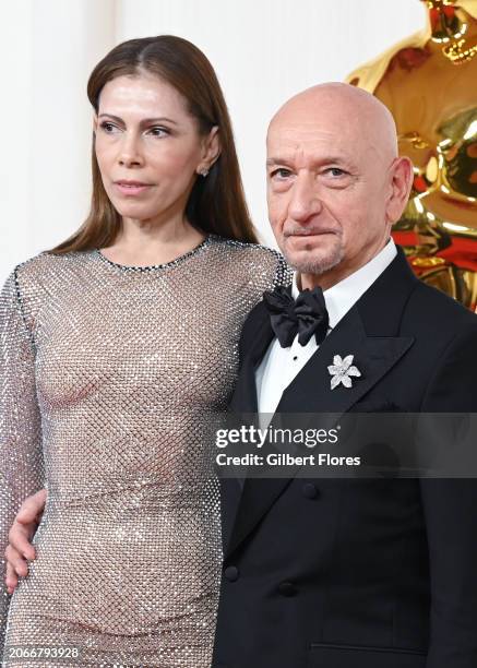 Daniela Lavender and Ben Kingsley at the 96th Annual Oscars held at at the Ovation Hollywood on March 10, 2024 in Los Angeles, California.