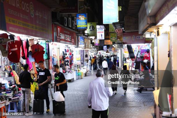 People walk the Souq in Manama, Bahrain on March 3, 2024.