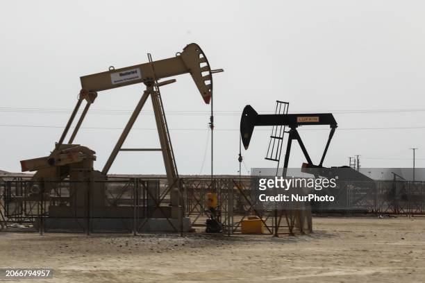 View of oil wells at Arab Desert in Jebel Dukhan, Bahrain on March 4, 2024.