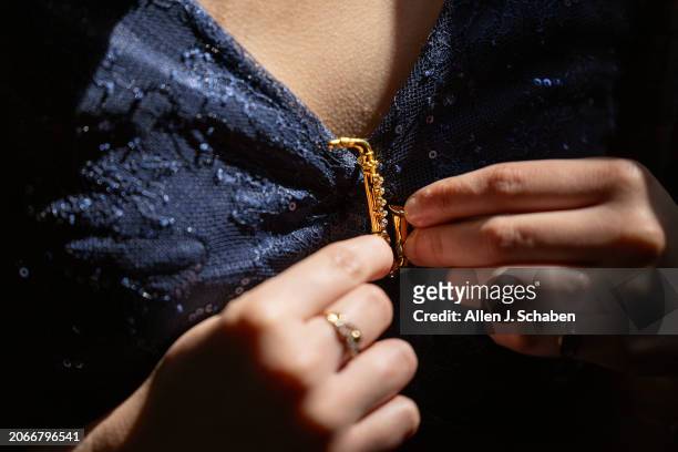 North Hollywood, CA Roosevelt High student junior, saxophone player and film participant Ismerai Calcaneo clutches her saxophone pin while riding an...
