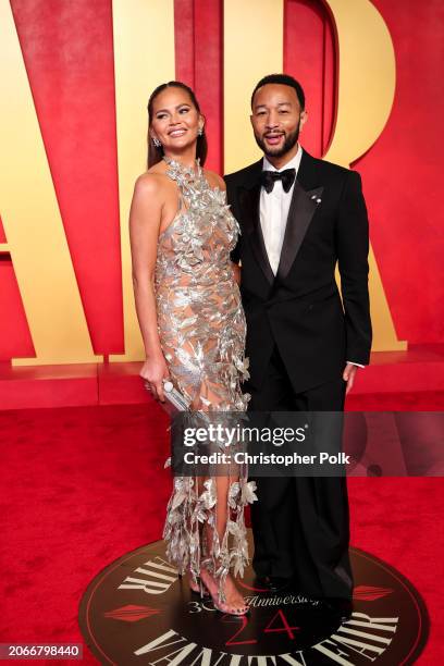 Chrissy Teigen and John Legend at the 2024 Vanity Fair Oscar Party held at the Wallis Annenberg Center for the Performing Arts on March 10, 2024 in...