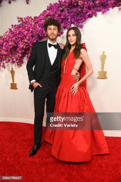 Juanpa Zurita and Macarena Achaga at the 96th Annual Oscars held at Ovation Hollywood on March 10, 2024 in Los Angeles, California.