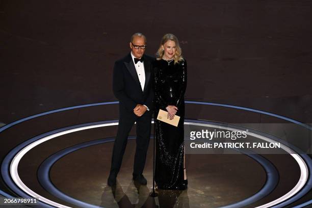 Actor Michael Keaton and Canadian-US Catherine O'Hara present the award for Best Makeup and Hairstyling onstage during the 96th Annual Academy Awards...