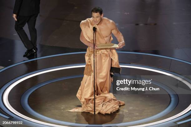 Hollywood, CA Jimmy Kimmel and John Cena during the live telecast of the 96th Annual Academy Awards in Dolby Theatre at Hollywood & Highland Center...