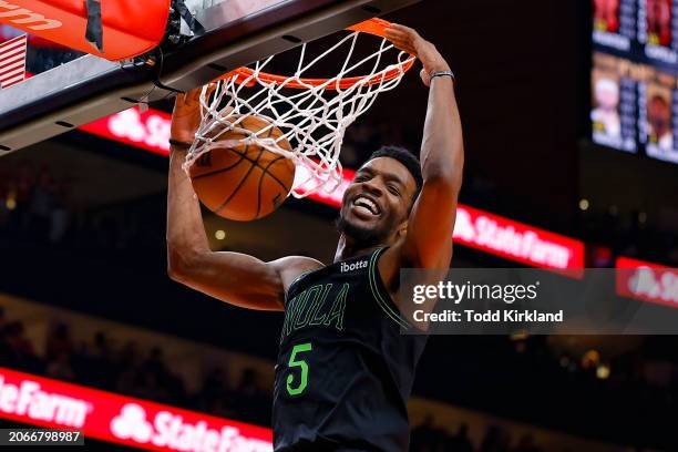 Herbert Jones of the New Orleans Pelicans dunks during the third quarter against the Atlanta Hawks at State Farm Arena on March 10, 2024 in Atlanta,...