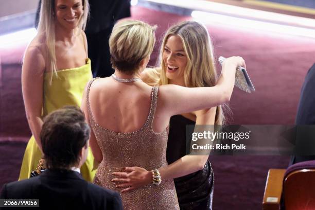 Greta Gerwig and Margot Robbie at the 96th Annual Oscars held at Dolby Theatre on March 10, 2024 in Los Angeles, California.