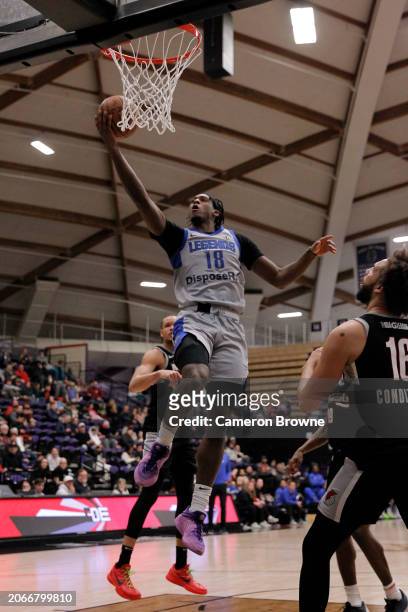 Olivier-Maxence Prosper of the Texas Legends goes up for a shot during the game against the Rip City Remix on March 10, 2024 at Chiles Center in...