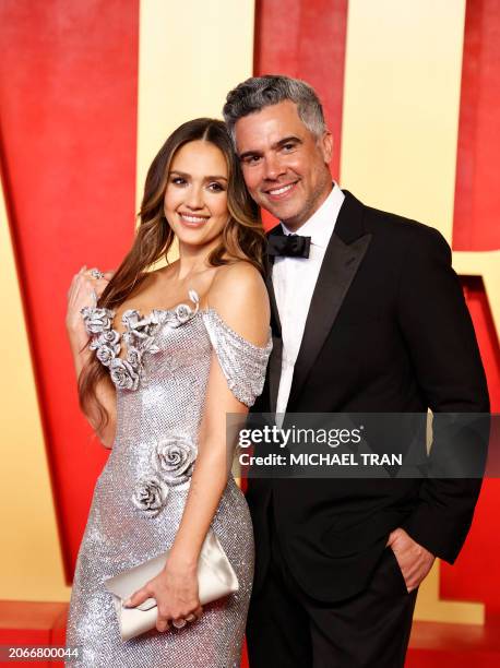 Actress Jessica Alba and husband, film producer Cash Warren, attend the Vanity Fair Oscars Party at the Wallis Annenberg Center for the Performing...
